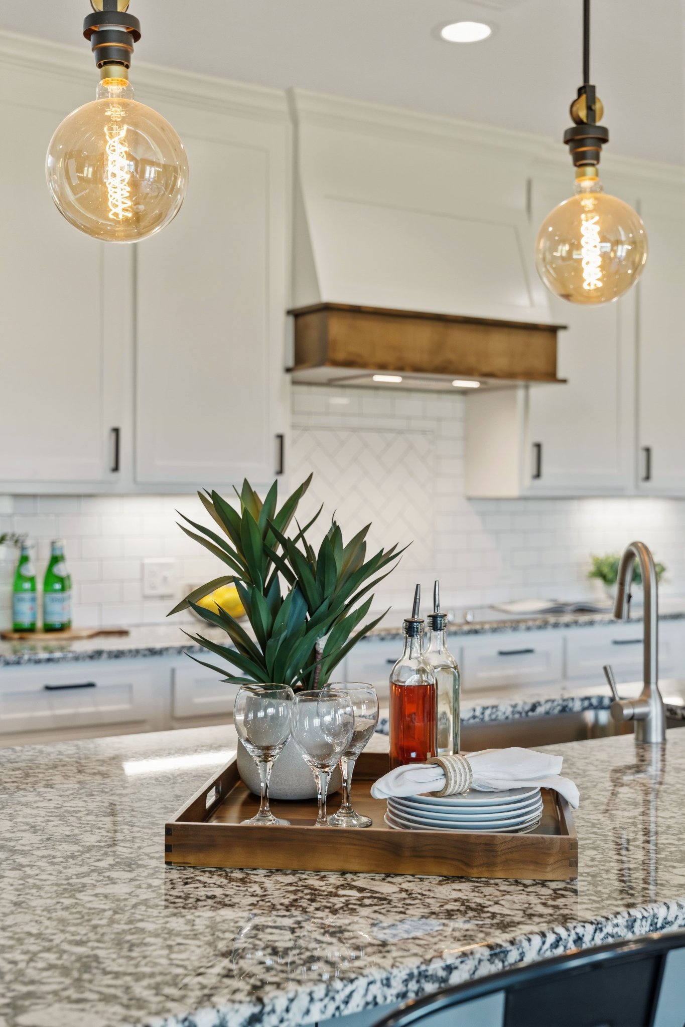 Kitchen — boucle chairs and chandelier