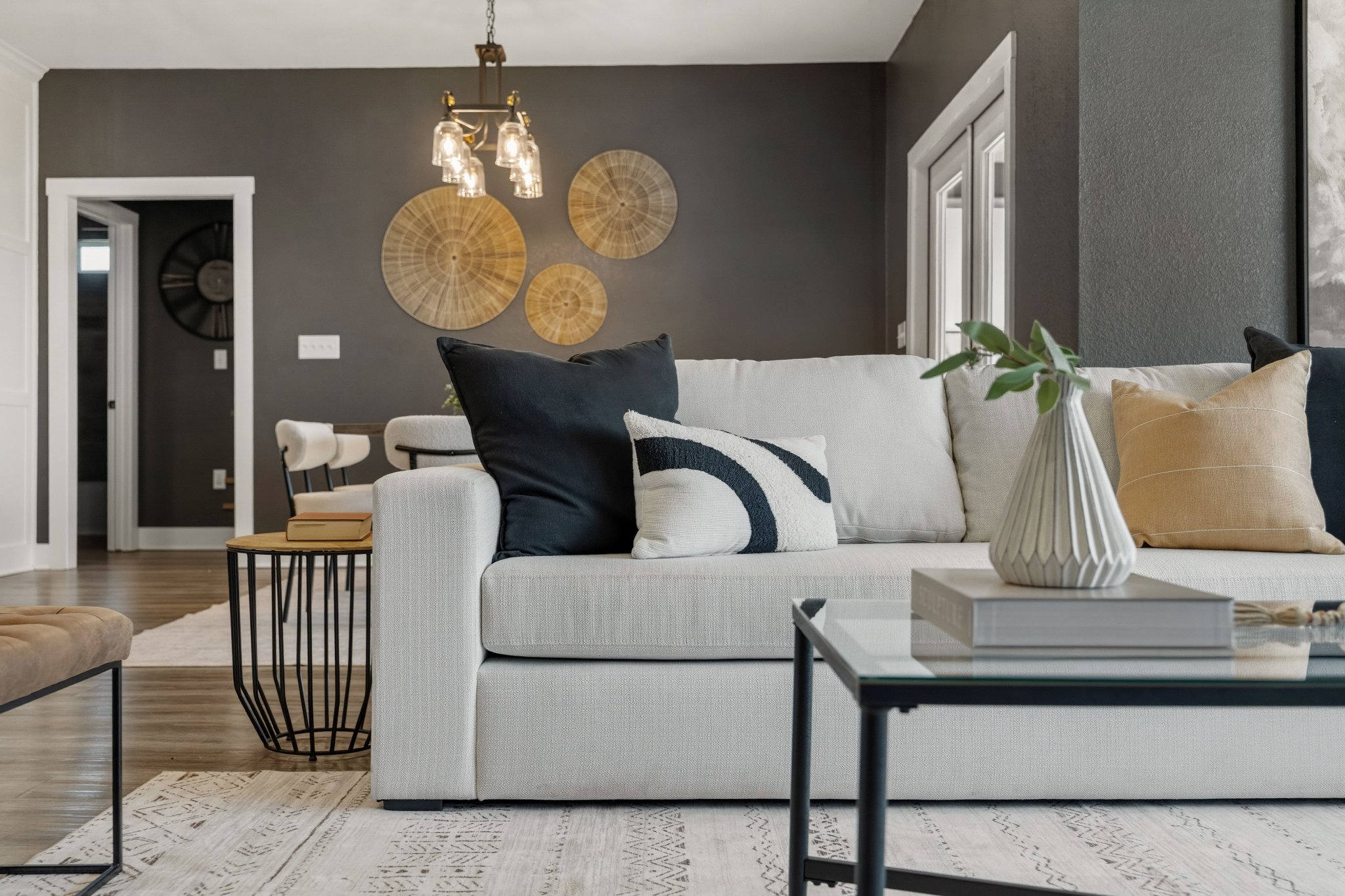 Living room — sofa and woven wall art