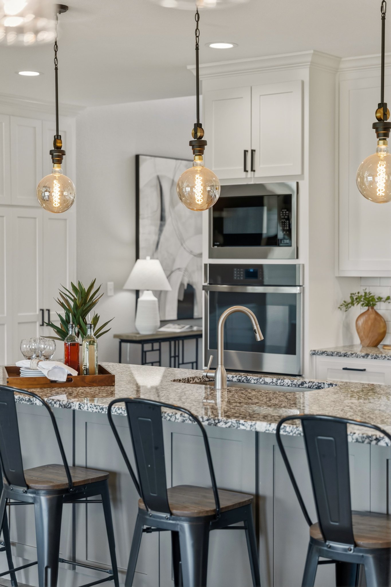 Kitchen island with globe pendants