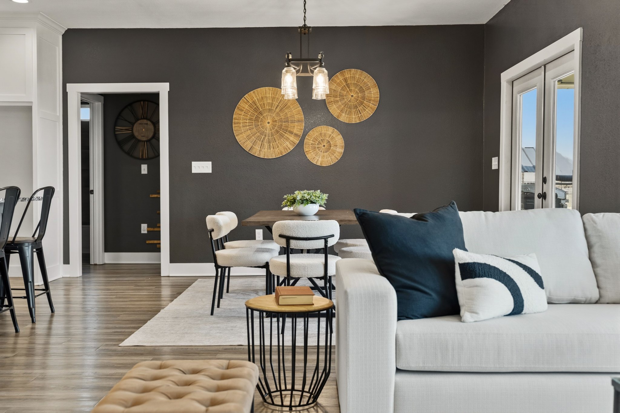 Open living and dining — woven wall art