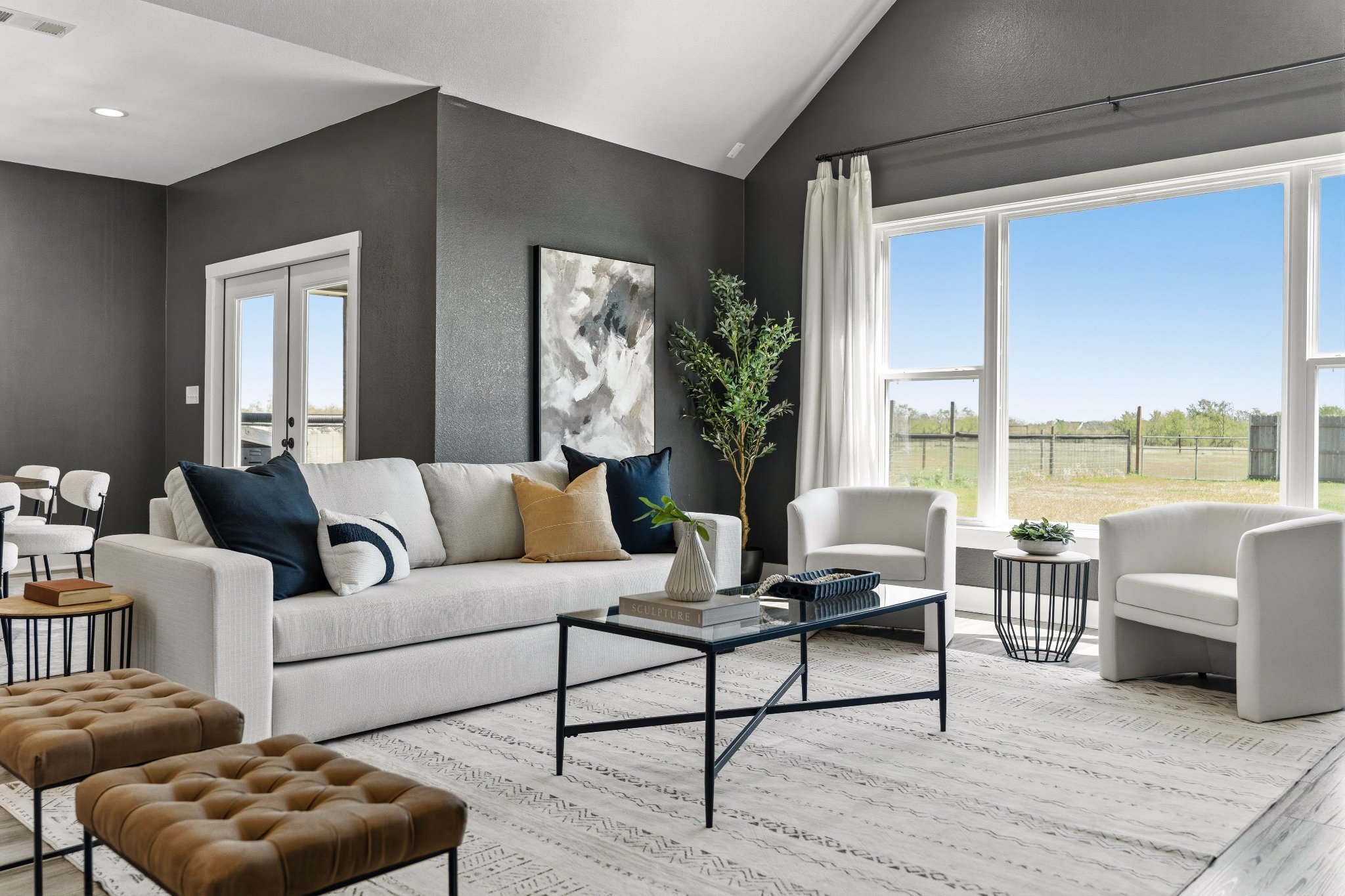 Vaulted living and dining — full staging view